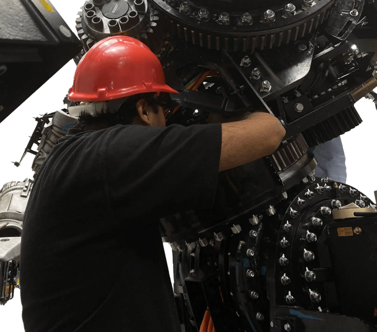 Technician working on custom gearbox services
