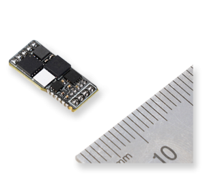 Image of the Digital Load Cell Amplifier with a metric ruler for scale