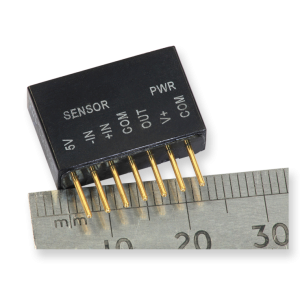 Image of Strain Gauge Amplifier together with metric ruler for scale