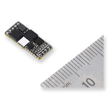 Image of the Digital Load Cell Amplifier with a metric ruler for scale
