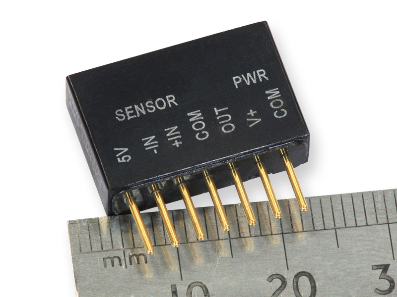 Image of Strain Gauge Amplifier together with metric ruler for scale